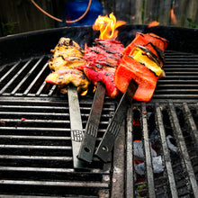 Load image into Gallery viewer, BLACK STEEL SKEWERS ON A BARBECUE
