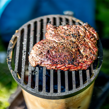 Load image into Gallery viewer, steak on axel perkins cast iron grill 
