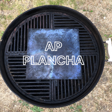 Load image into Gallery viewer, Overhead shot of the AP Plancha cooking steel on a weber barbecue with text overlay
