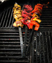 Load image into Gallery viewer, Hand forged skewers of meat and veg over charcoal 
